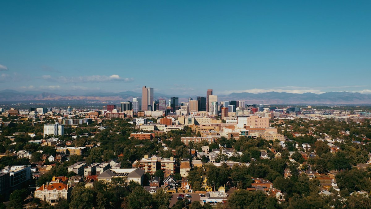 Denver skyline with the Rocky Mountains behind
