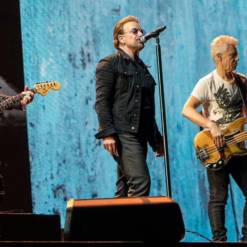 Bono and Adam Clayton of U2 on stage